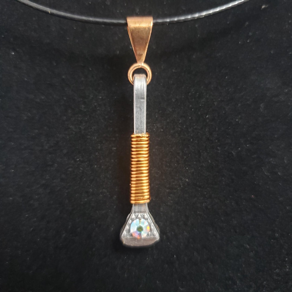 Horseshoe nail pendant - wire wrapped