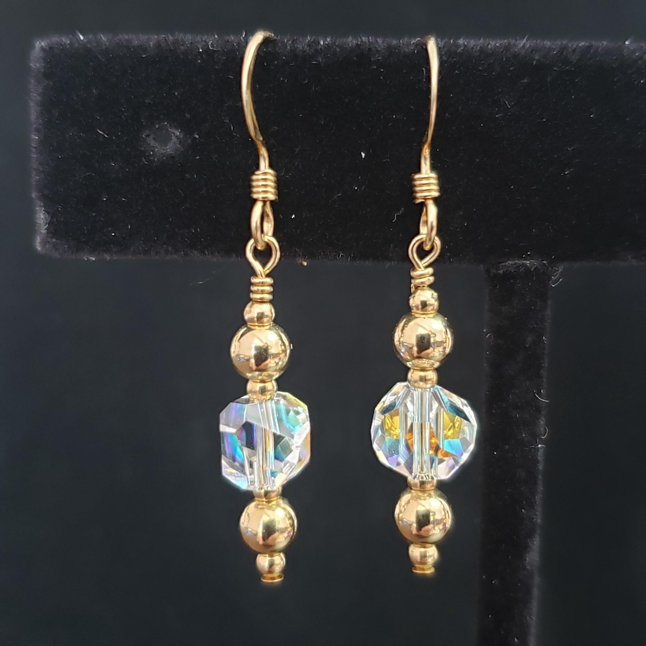 Swarovski crystal and gold-filled earrings.
