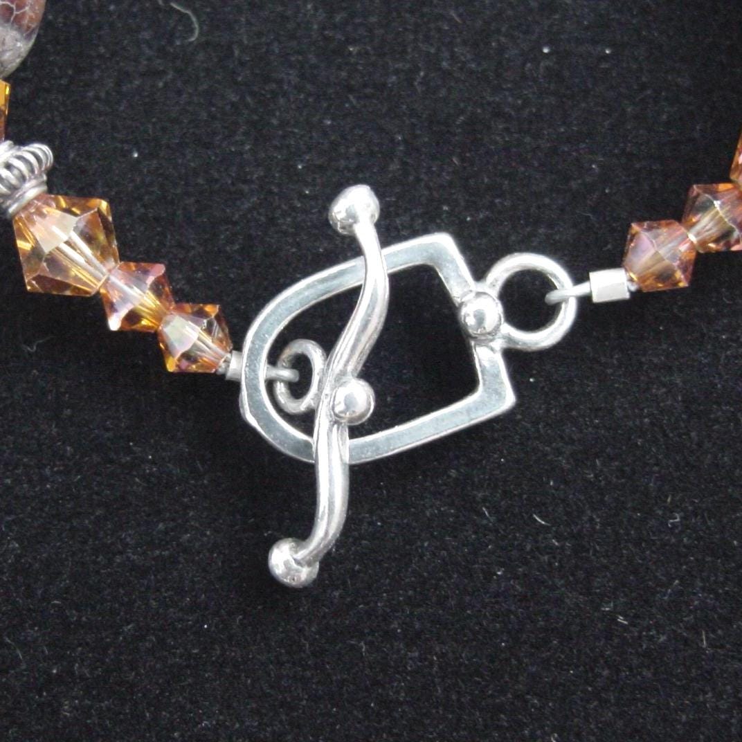 Tibetan agate and Bali silver bracelet, with Swarovski crystal and sterling toggle.